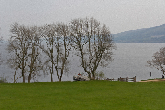 Loch Ness and boat jetty next to Urquhart Castle
