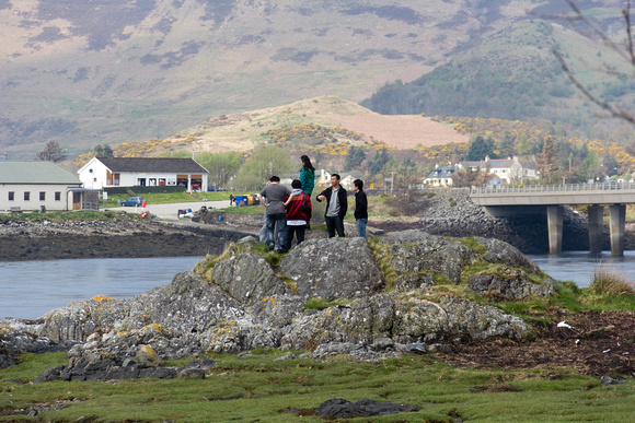 Tourists trying to get a vantage view of the Eilean Doonan Castl