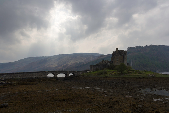 The Eilean Donan Castle along with the stone bridge in front wit