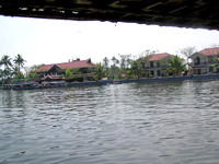View of lake resort framed from the top of a houseboat