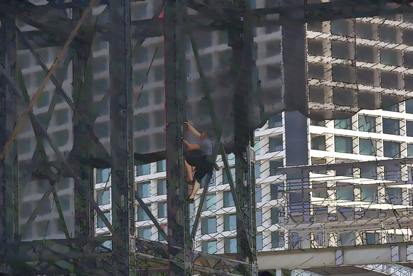 Man climbing a steel ladder in the Marina area in Singapore