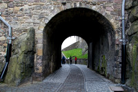 The Portcullis inside a corridor in Edinburgh Castle, with touri