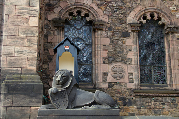 Lion sculpture in front of the Scottish National War Memorial inside Edinburgh Castle