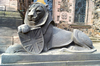 Sculpture of a lion in front of the Scottish National War Memori