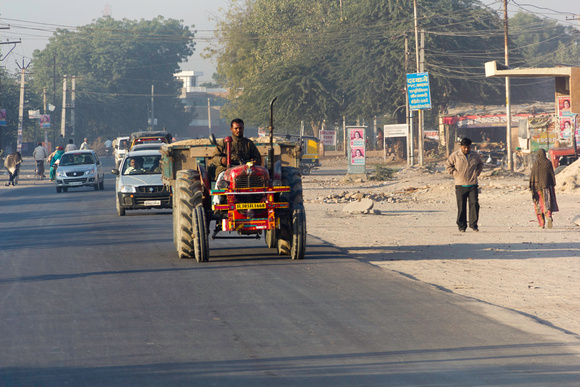 Tractor and cars on a road in Jodhpur