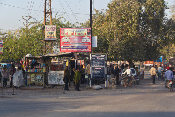 People at a roadside gathering point in Jodhpur early morning