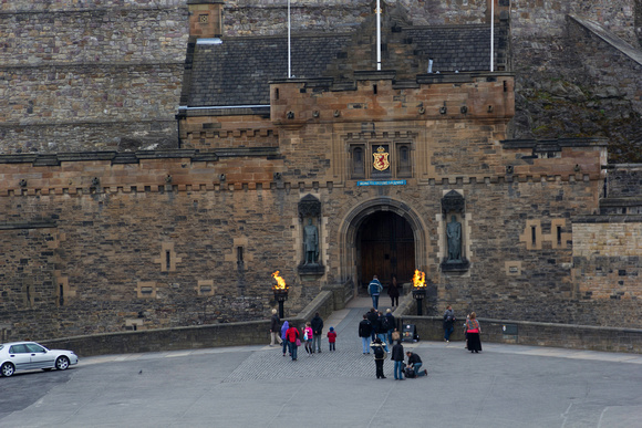 Tourists just outside the gate of Edinburgh Castle in Scotland i